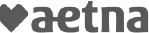Heart-shaped Aetna logo with a stylized design featuring shades of gray.