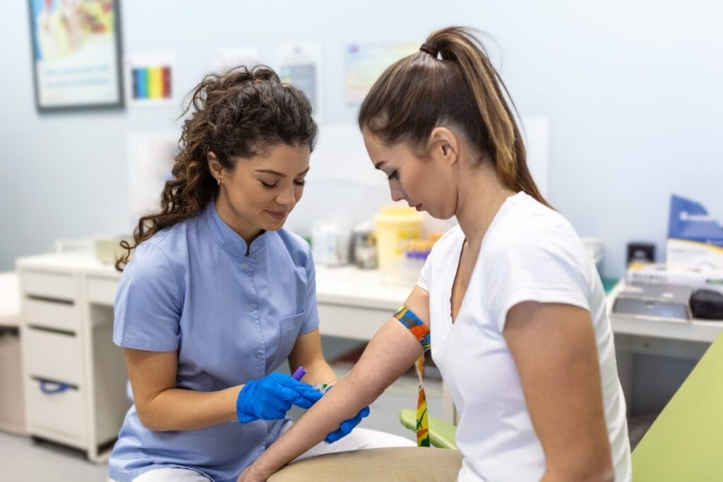 Woman getting ready for a blood test to see if she has iron deficiency.